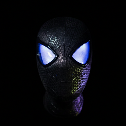 Black Spider-Man mask with glowing blue eyes on a black background