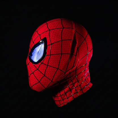 Red superhero mask with web pattern on a black background